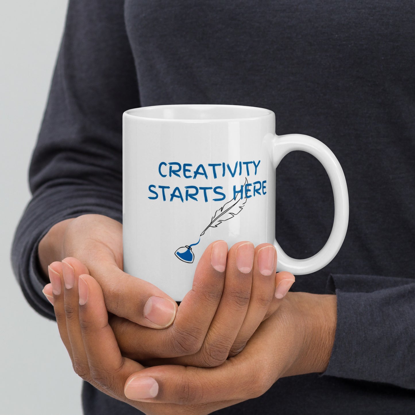 Creativity starts here White glossy mug